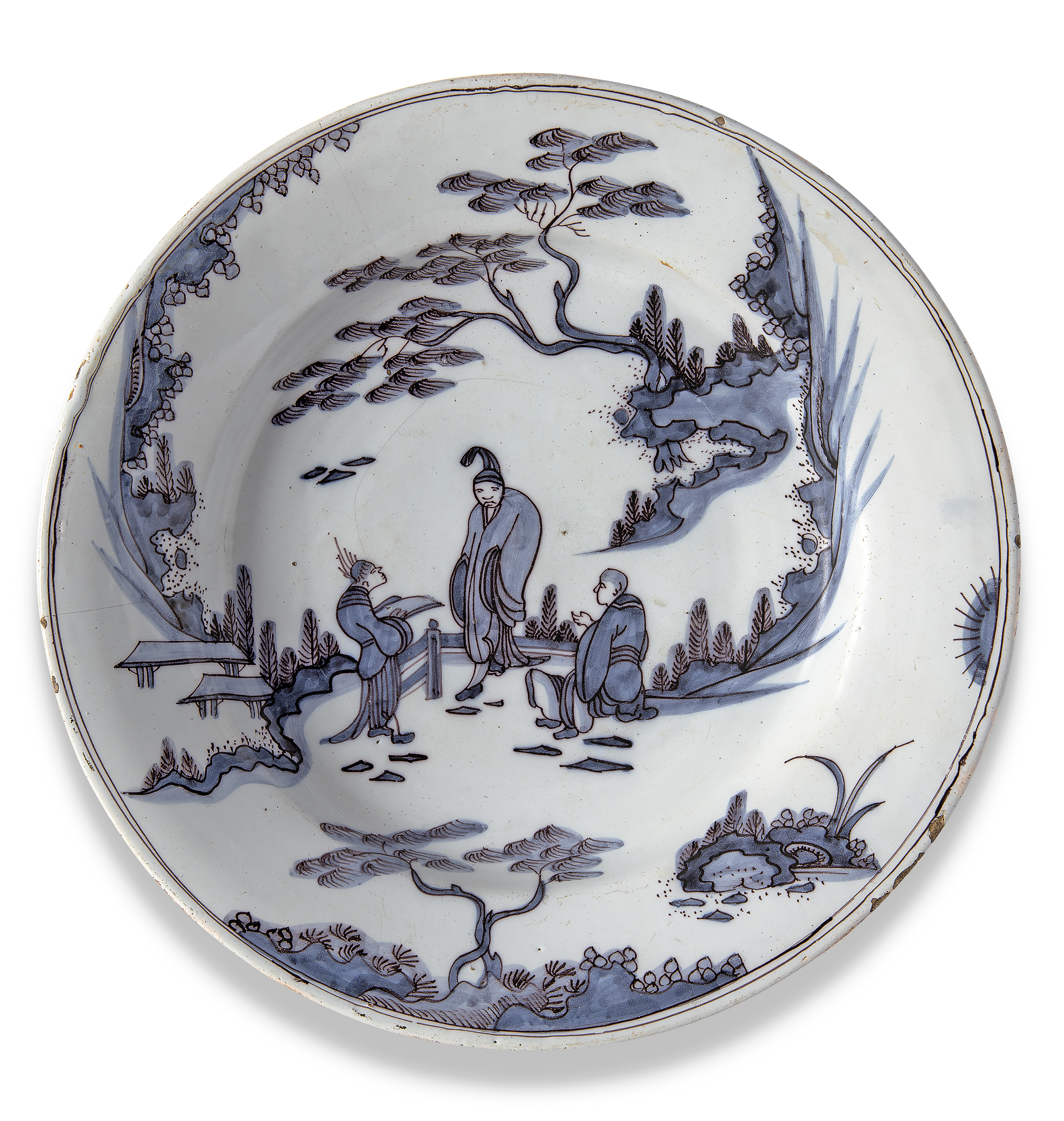 A Continental fayence chinoiserie dish, possibly Frankfurt, c.1700, painted in shades of blue and...