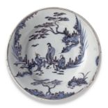 A Continental fayence chinoiserie dish, possibly Frankfurt, c.1700, painted in shades of blue and...