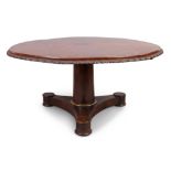 A Regency mahogany tilt top breakfast table, c.1820, the rosewood crossbanded circular top with b...