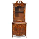 A French walnut serpentine fronted vitrine