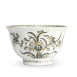 A Vienna (du Paquier) porcelain miniature bowl, c.1735, painted in Schwarzlot with flowering shru...