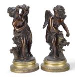 A pair of French bronze models of Cupid and a Young Girl