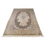 A Persian Nain carpet