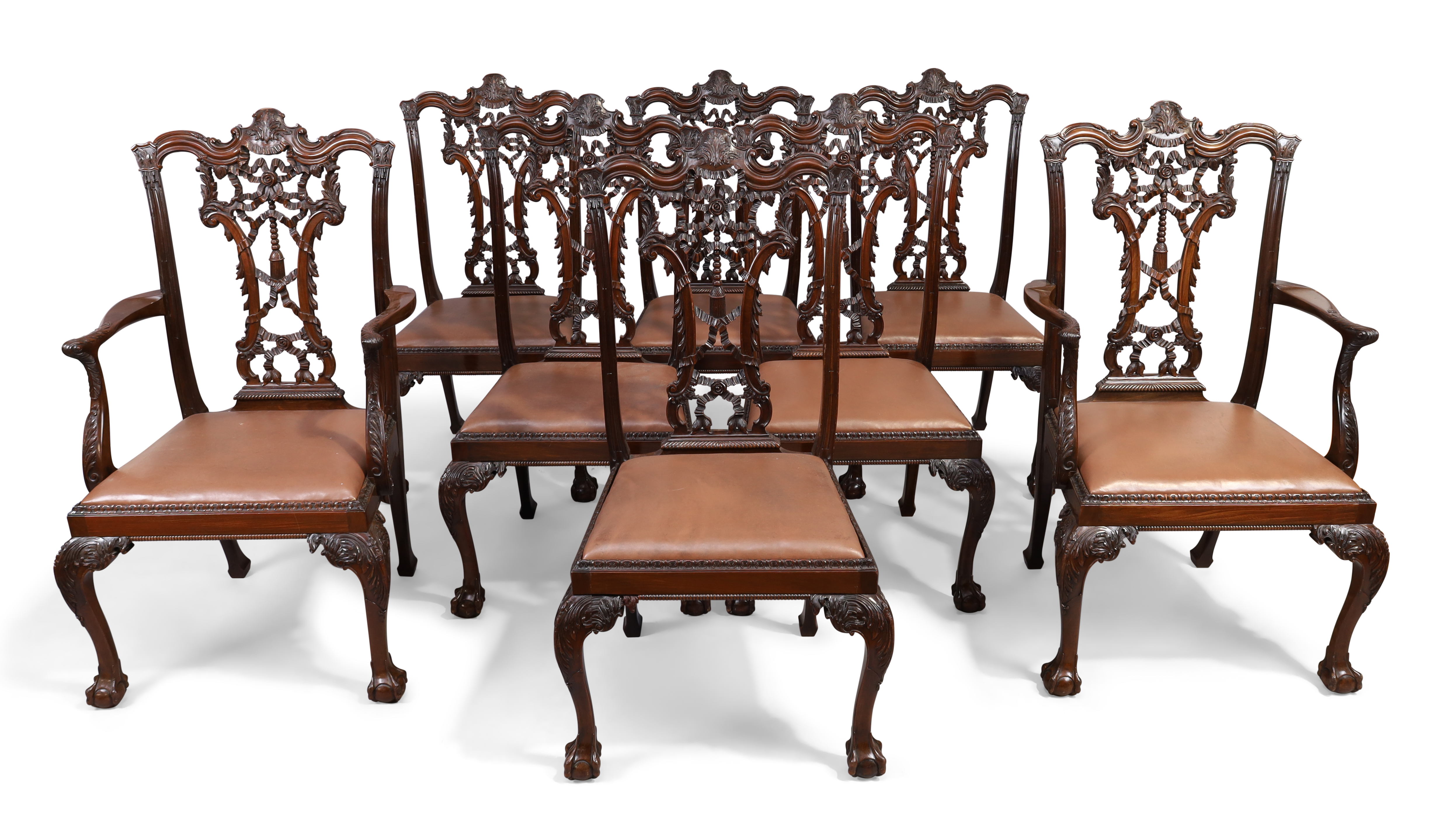 A set of eight George III style mahogany dining chairs