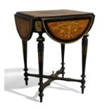 A French ebonised and walnut drop leaf centre table