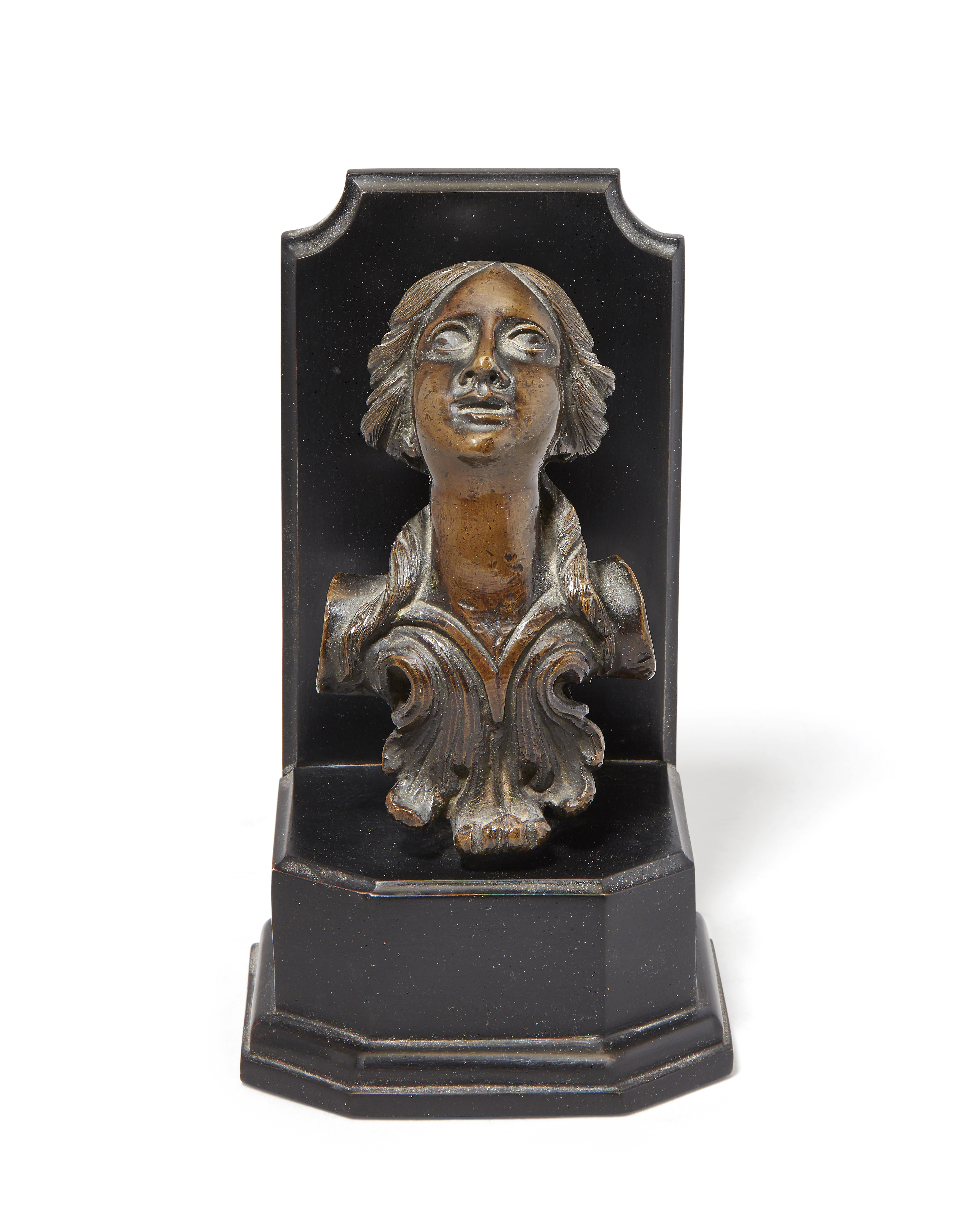 A North Italian bronze door knocker or finial, probably 17th century, cast as a female bust with ...