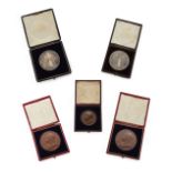 Five Victorian bronze and silver medallions, all in fitted cases, comprising: two silver National...