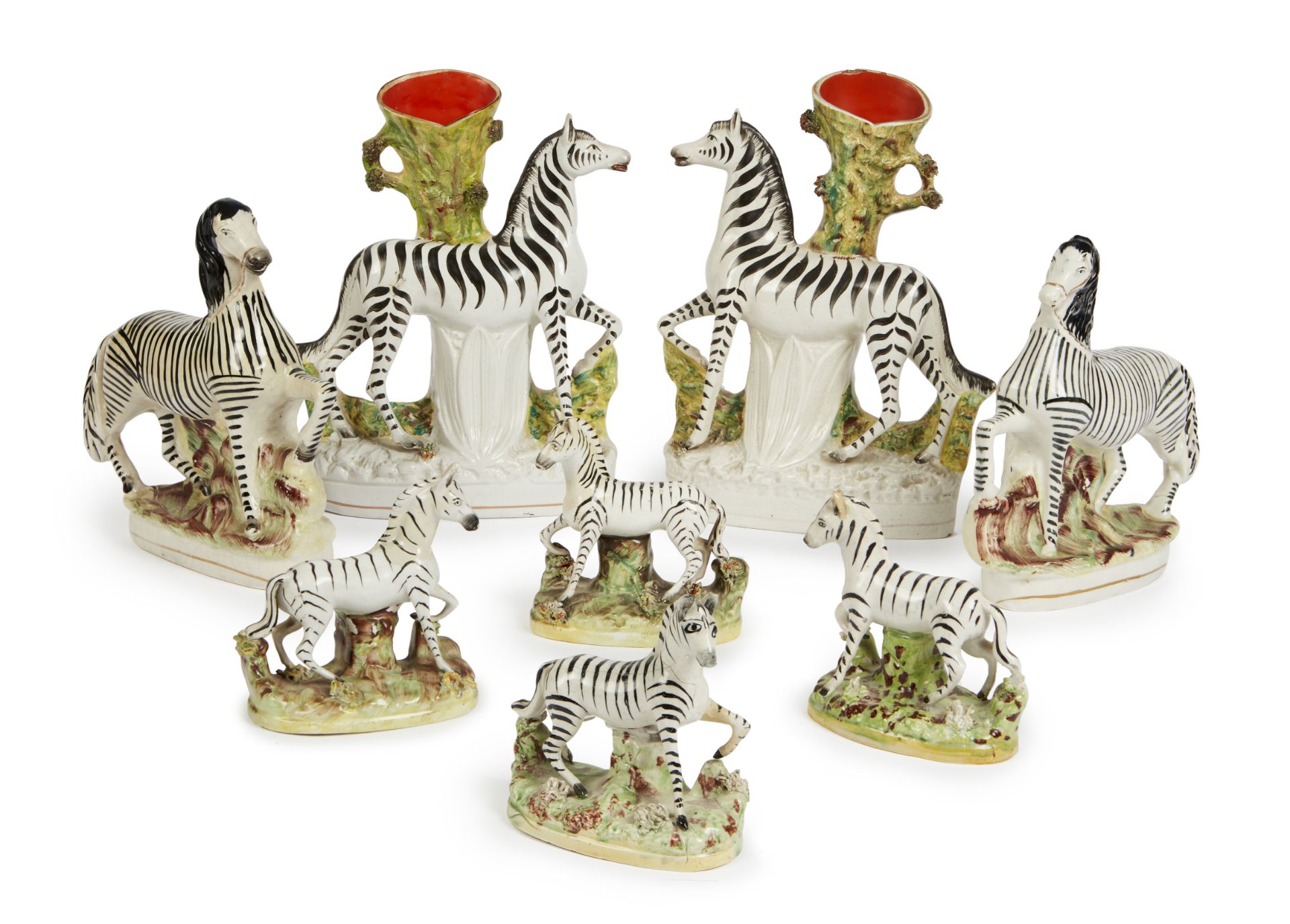 A collection of Staffordshire flatback zebras