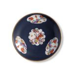 A Meissen porcelain blue-ground Kakiemon saucer-dish
