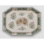 An Ansbach fayence armorial octagonal rectangular tray, c.1730-40, the centre with two coats of a...