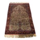 A Persian Isfahan silk rug
