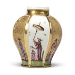 A Meissen porcelain hexagonal chinoiserie tea caddy and cover, probably c.1728, finely painted wi...
