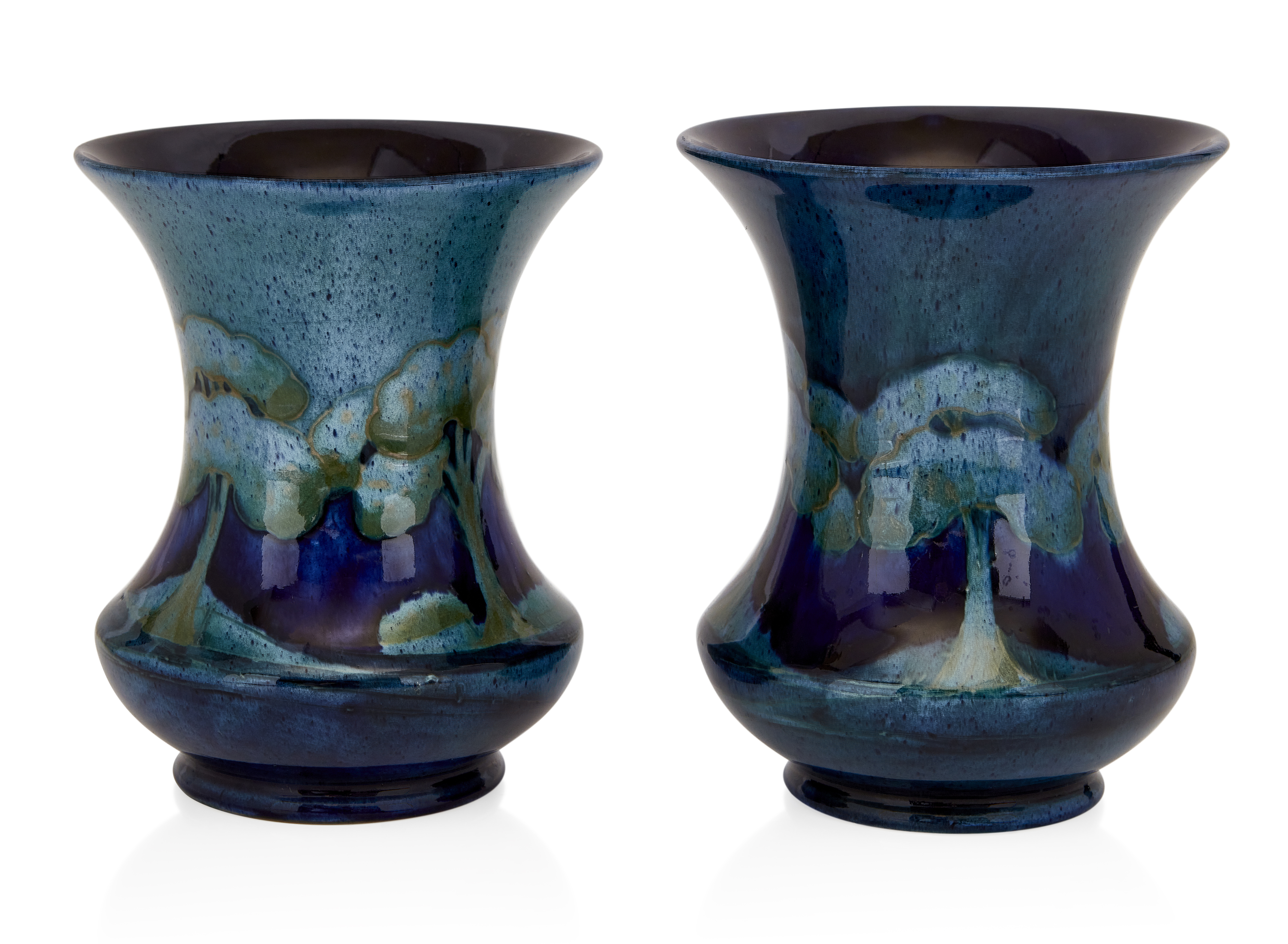 William Moorcroft (1872-1945) Pair of Moonlit blue vases, circa 1920 Glazed earthenware Impresse...