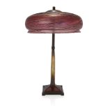 Attributed to Pallme Konig Art Nouveau table lamp with large domed shade in iridescent deep pink...