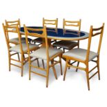 Manner of Ico Parisi Dining table and six dining chairs, circa 1950 Beech, glass, leather Table ...