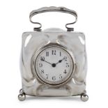 William Neale Arts & Crafts square form desk clock on bun feet with swing handle, 1907 Silver, w...