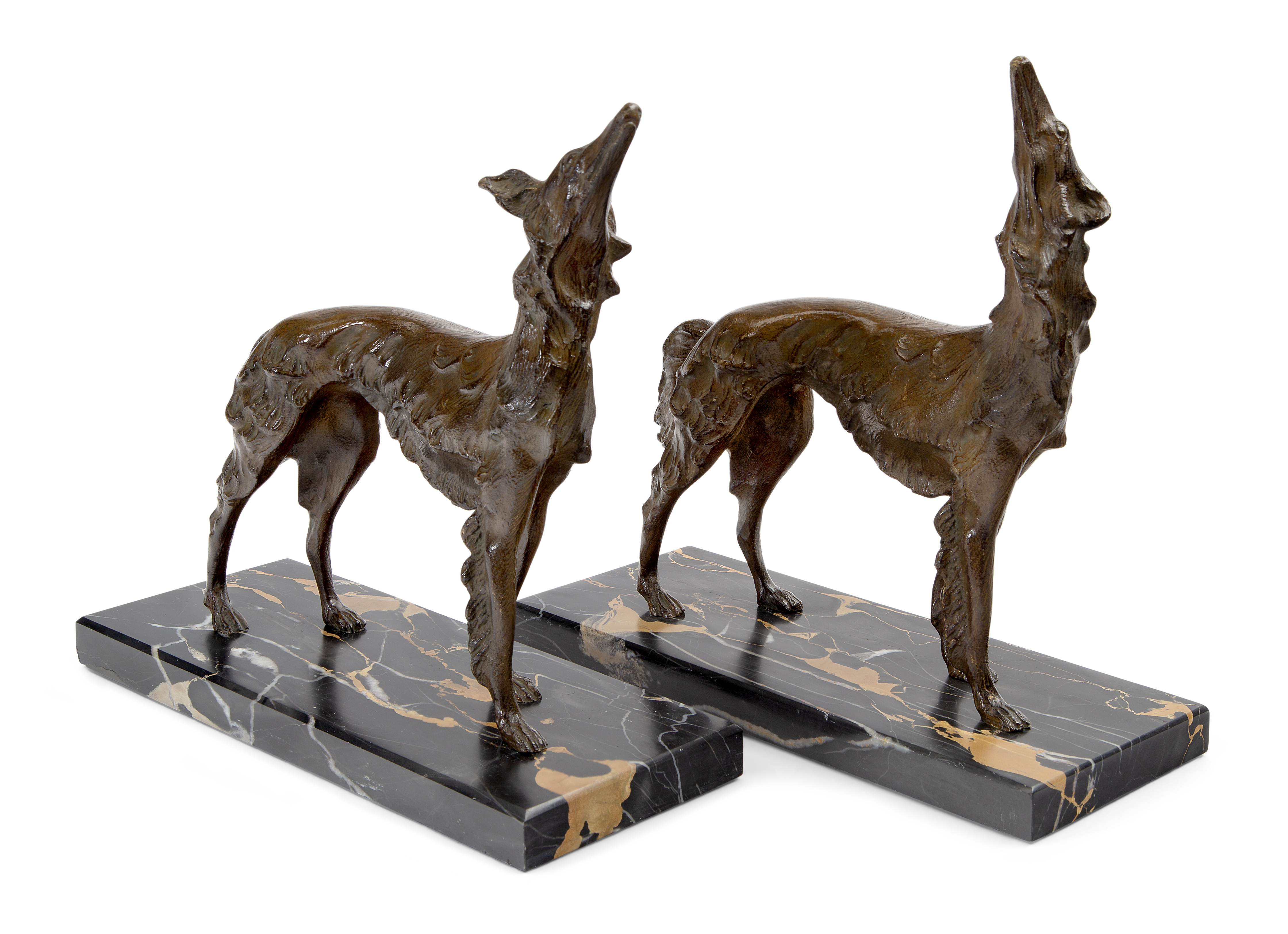 Art Deco Two sculptures of a borzoi dog, possibly bookends or garniture, circa 1930 Bronze, marb...