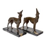 Art Deco Two sculptures of a borzoi dog, possibly bookends or garniture, circa 1930 Bronze, marb...