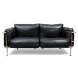 After Le Corbusier 'LC3' style sofa, circa 1980 Chromed metal, leather upholstery 79cm high, 171...