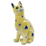 Emile Galle (1846-1904) Yellow faience cat with green eyes and blue hearts, circa 1900 Glazed ea...