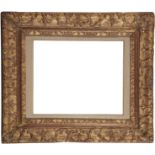 A Carved and Gilded Louis XIII Style Frame,  18th century-  with leaf sight, plain hollow, the ...