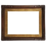 A French Provincial Carved Walnut Frame,  19th century-  the plain knull with shell and foliate...