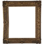 An English Carved and Gilded Louis XIV Style Pierced Frame,  18th century-  with leaf sight, sa...