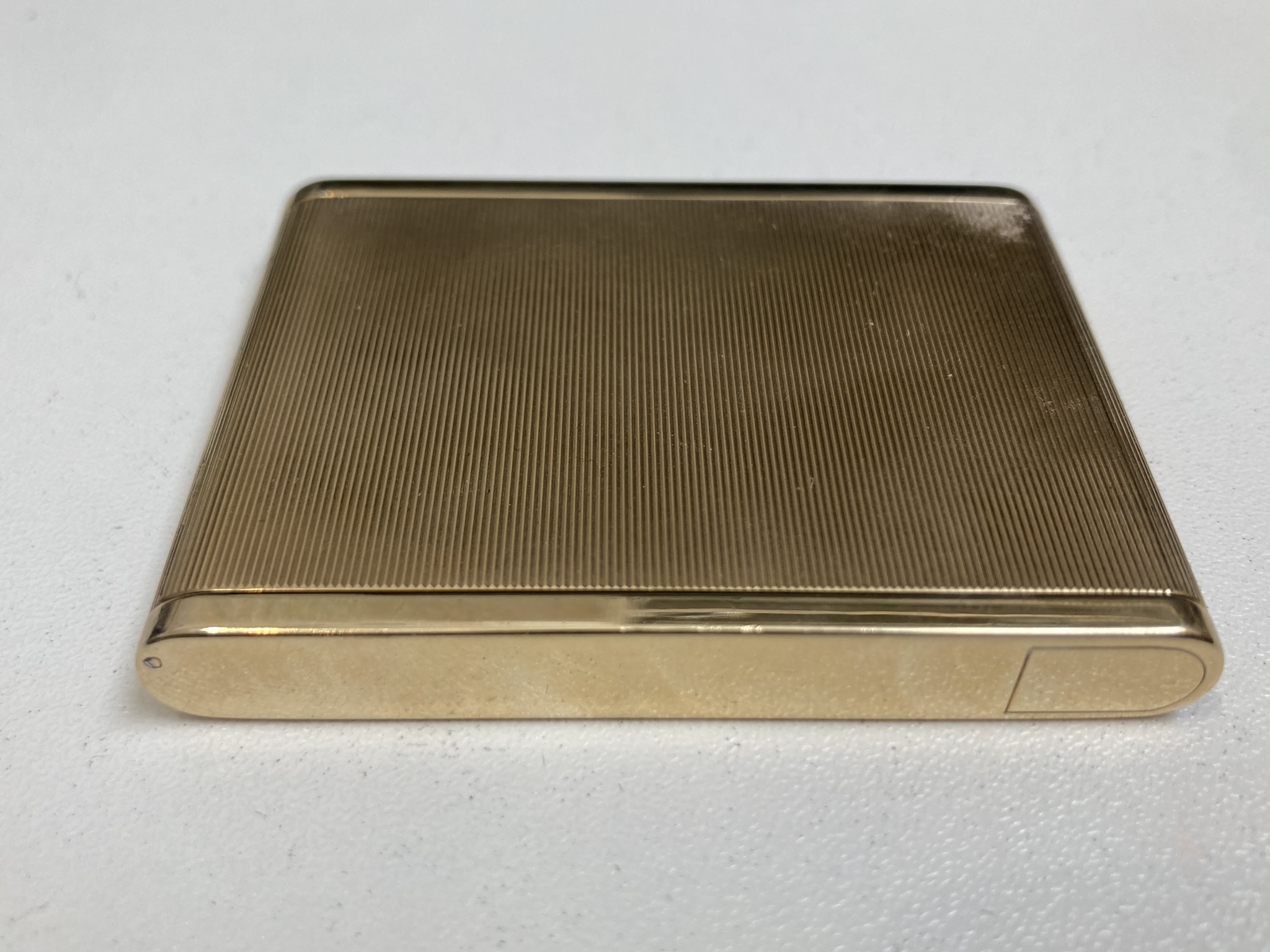 Cartier. A 9ct gold powder compact, - Image 9 of 10