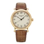 Patek Philippe. An 18ct gold automatic calendar wristwatch, Circa 2002