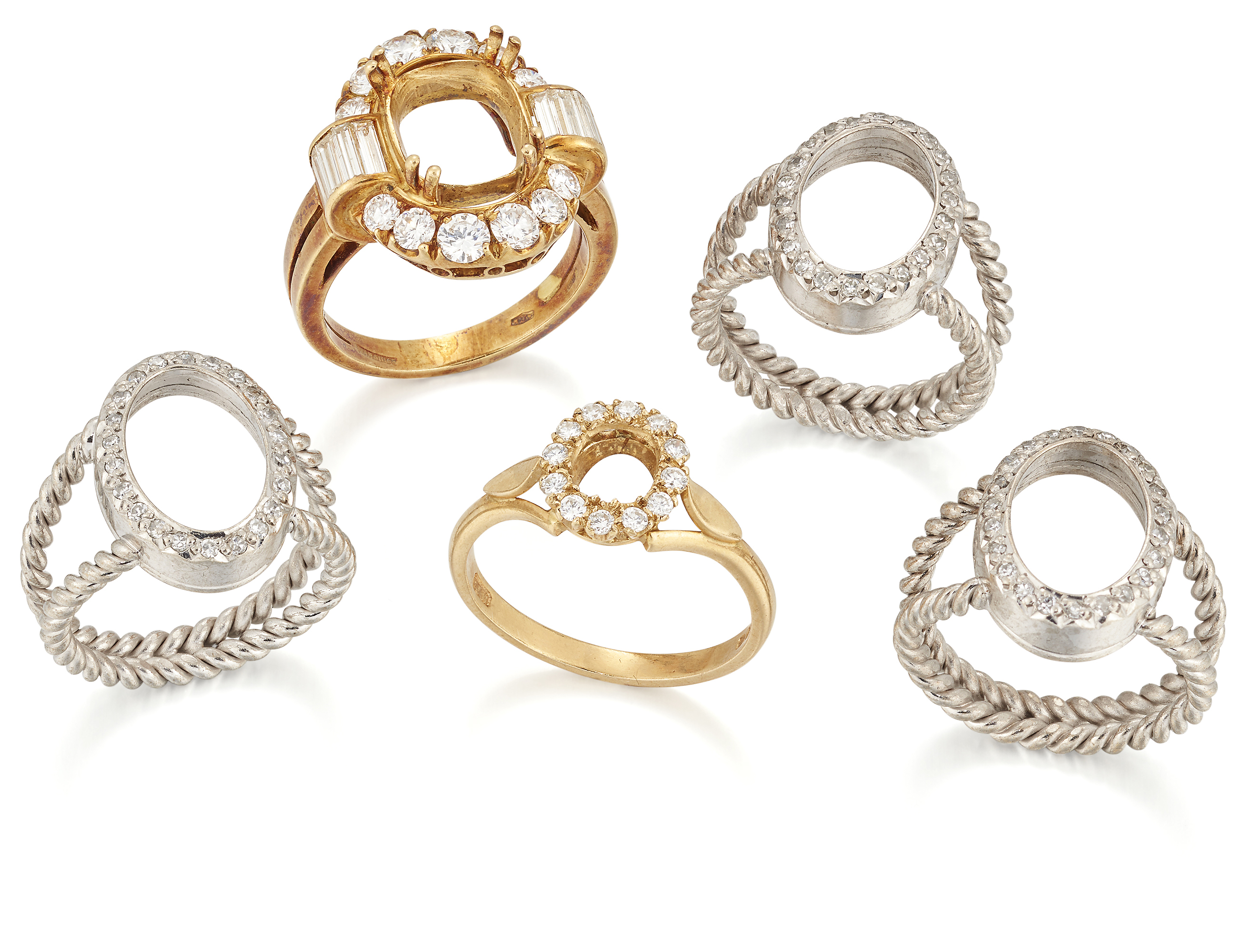 A group of five diamond set ring mounts,