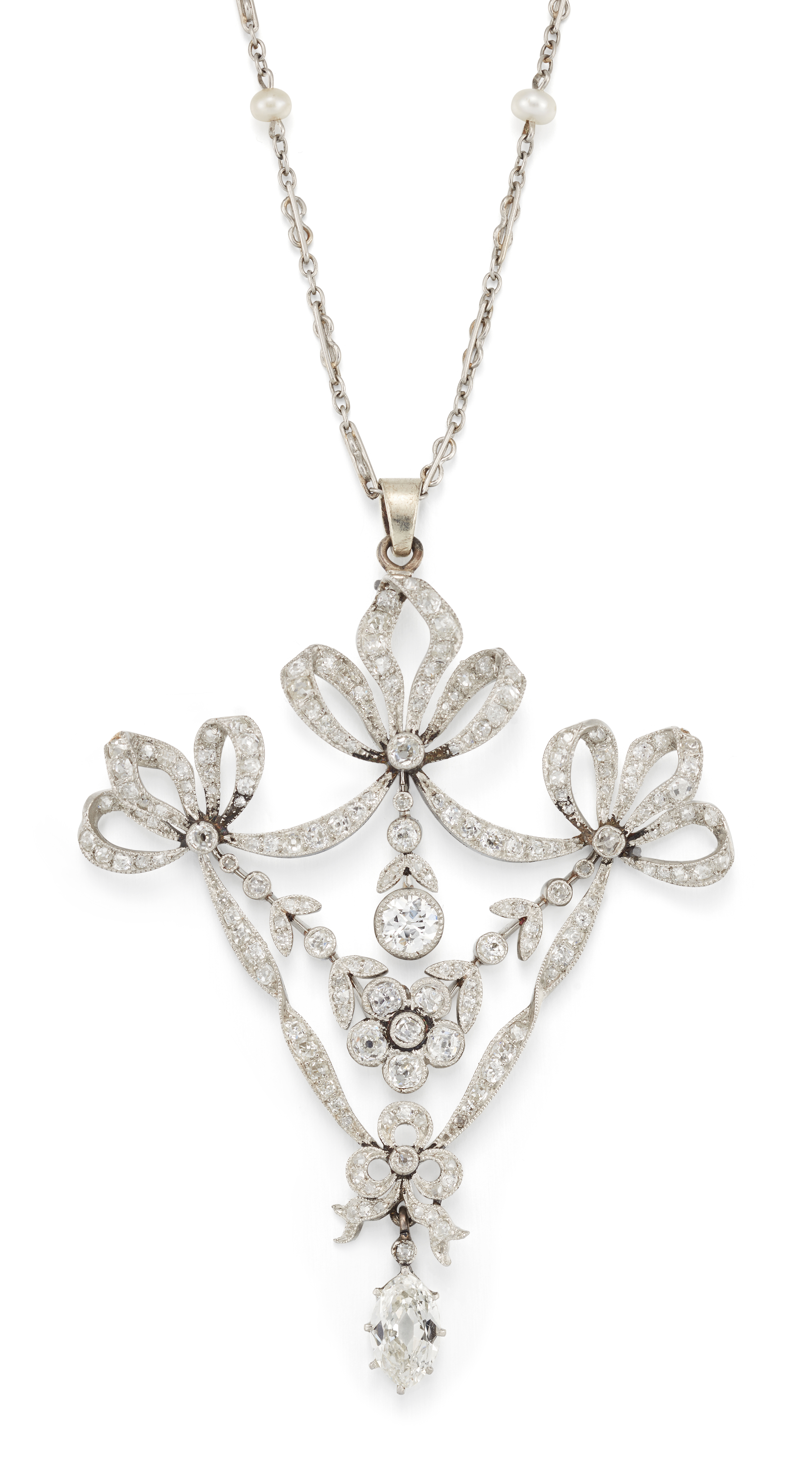 A Belle Époque platinum and diamond brooch/pendant,