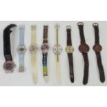 A collection of wristwatches, comprising: a Tissot W150 Woodwatch; a Tissot W151 Woodwatch; four ...