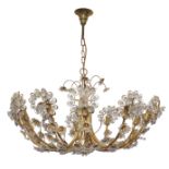 Palwa, a twelve light chandelier, circa 1970, gilt brass, faceted glass, electrical fittings, 77c...