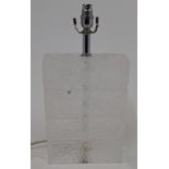 A contemporary lucite table lamp, 20th / 21st century, of tapering rectangular form, designed as ...