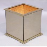 A 1970's brass and mirrored glass planter/box, raised on perspex feet, 44cm high, 43cm wide, 43cm...