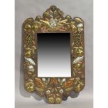 A continental brass and copper mirror, late 20th century, with various fruit and foliage decorati...