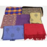 A group of silk and cashmere scarves, of various makers and designs, together with three cashmere...