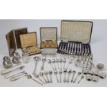 A collection of silver, comprising: a near pair of six division toast racks, Birmingham, 1956-195...