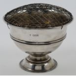 An Edwardian silver rose bowl, London, 1910, Charles Boyton & Son Ltd, of circular foot, with ass...