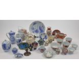 A large group of Japanese ceramics, together with a Chinese blue and white bird feeder and three ...