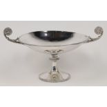 A silver tazza, Sheffield, 1927, James Dixon & Sons, with twin scrolling handles having lion mask...