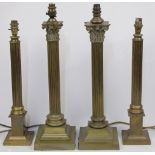 Two pairs of brass columnar table lamps, 20th century, the first pair modelled as Corinthian colu...