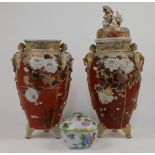 A pair of Japanese satsuma style vases, 20th century, each with applied twin phoenix lugs and rai...