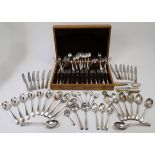 A mixed group of silver and plate flatware, to include, a George III fork, London, 1788, George S...
