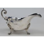 A late Victorian silver sauceboat, Sheffield, 1900, Lee & Wigfull (Henry Wigfull), with shaped ri...