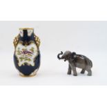 A Worcester style porcelain cobalt blue ground vase, late 19th century, with pierced twin handles...