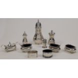 A group of silver, comprising: a sugar caster, Sheffield, 1936, Harrison Brothers & Howson (Georg...