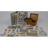 A quantity of stamps and currency, to include a small collection of loose and album stamps and fi...