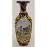 A Sèvres style cobalt blue and gilt decorated baluster vase, 19th century, with central oval cart...