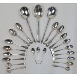 A pair of silver serving spoons with figural terminals, Sheffield, probably 1898, Walker & Hall, ...